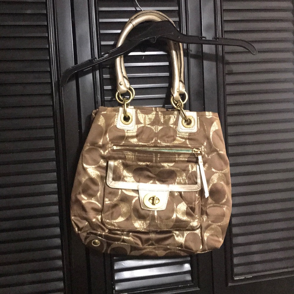Gold and brown coach purse